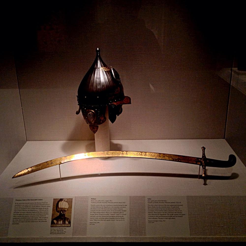 Ottoman saber and helmet from the 16th century.The weapons bear Arabic inscriptions.