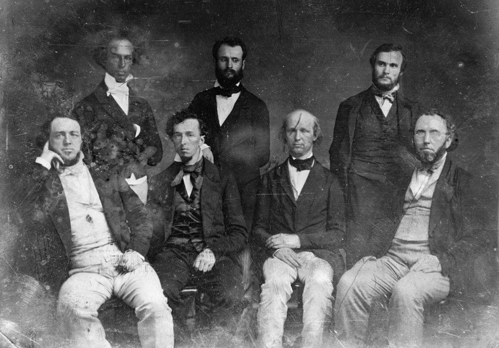 Mathew Brady photograph of the staff of the New York Tribune c. 1850.  Dana is standing in the middle. 